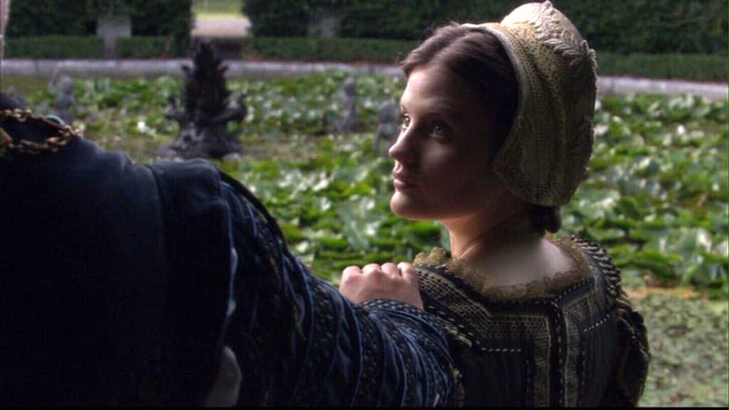 Young woman sitting in a garden with a man's hand on her shoulder. With no portraits of Mary Basset, I picked a screen shot from Showtimes' The Tudors to show a young court lady in a situation that might have been similar to Mary's...  